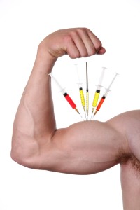 Muscular bicep of young man depicting steroid use - isolated